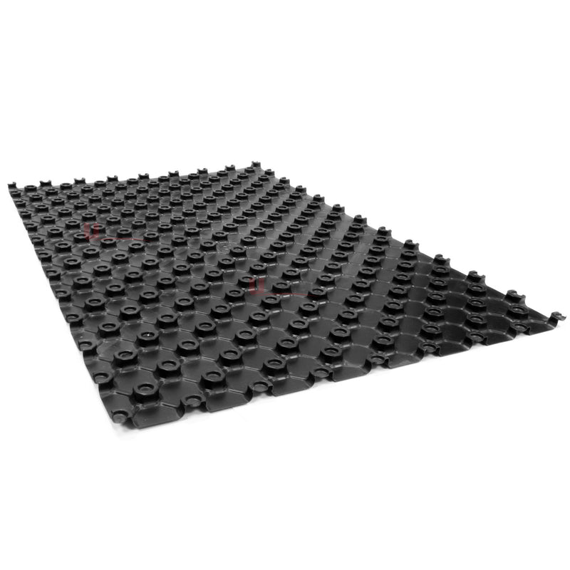 Black AD-TRAY castellated panel used to retain underfloor heating pipe before screeding