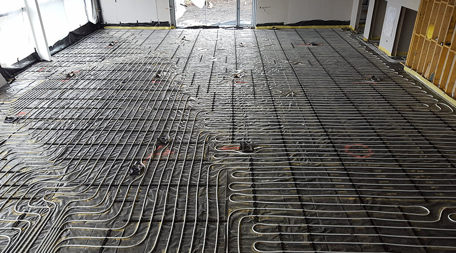 AD-RAIL underfloor heating circuits secured before screeding