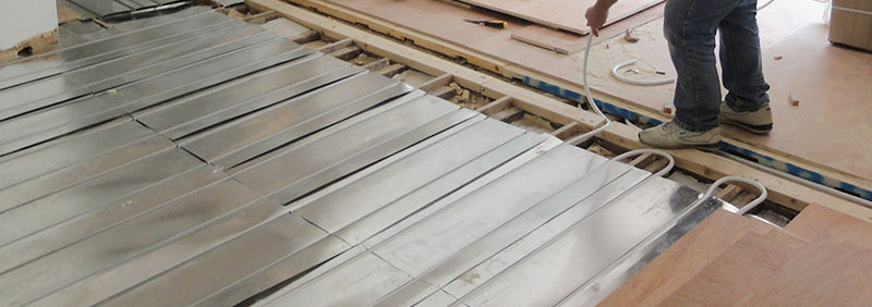 Water underfloor heating for suspended timber floors