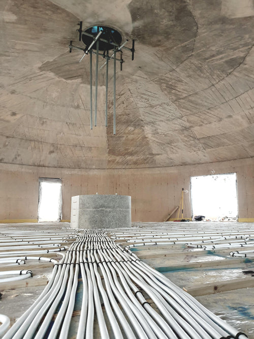 Original concrete interior of the water tower before floor installation